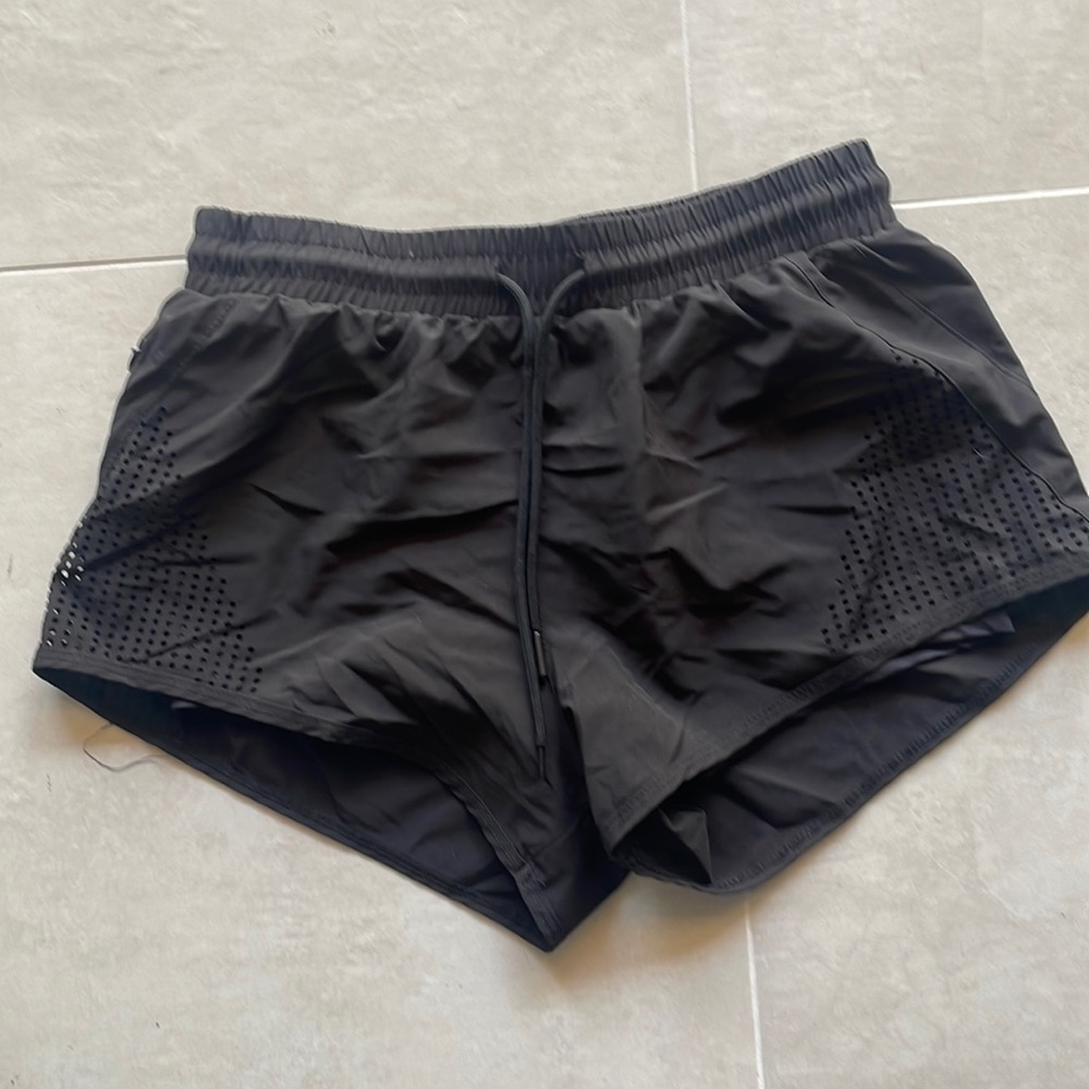 Women’s Revival athletic shorts, black with drawstring waist, size medium